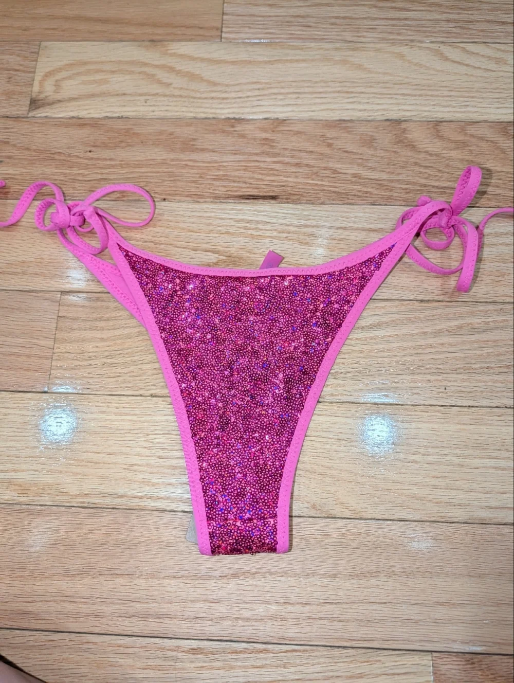 BB6. NWT SKIMS SEQUIN TIE BIKINI BOTTOMS IN FLAMINGO